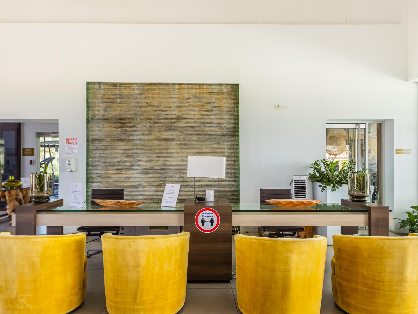 - Our resort's reception in the lobby provides a friendly and professional greeting upon your arrival. - Experience seamless check-in at our stylishly designed lobby reception. - Enjoy a welcoming atmosphere at our resort's lobby reception