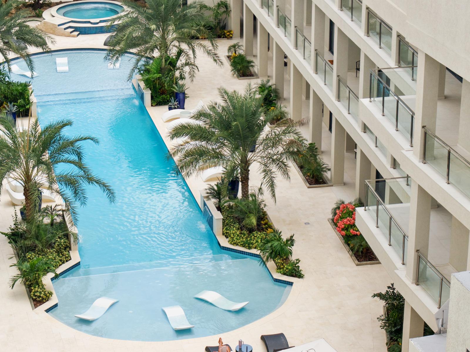 Dive into the lap of luxury – an aerial view of our serene pool oasis. (1)