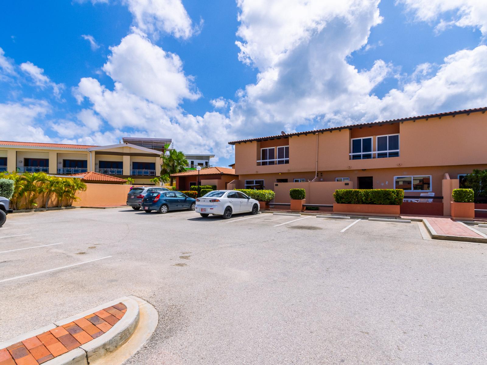 Ample free parking pace in front of the condos