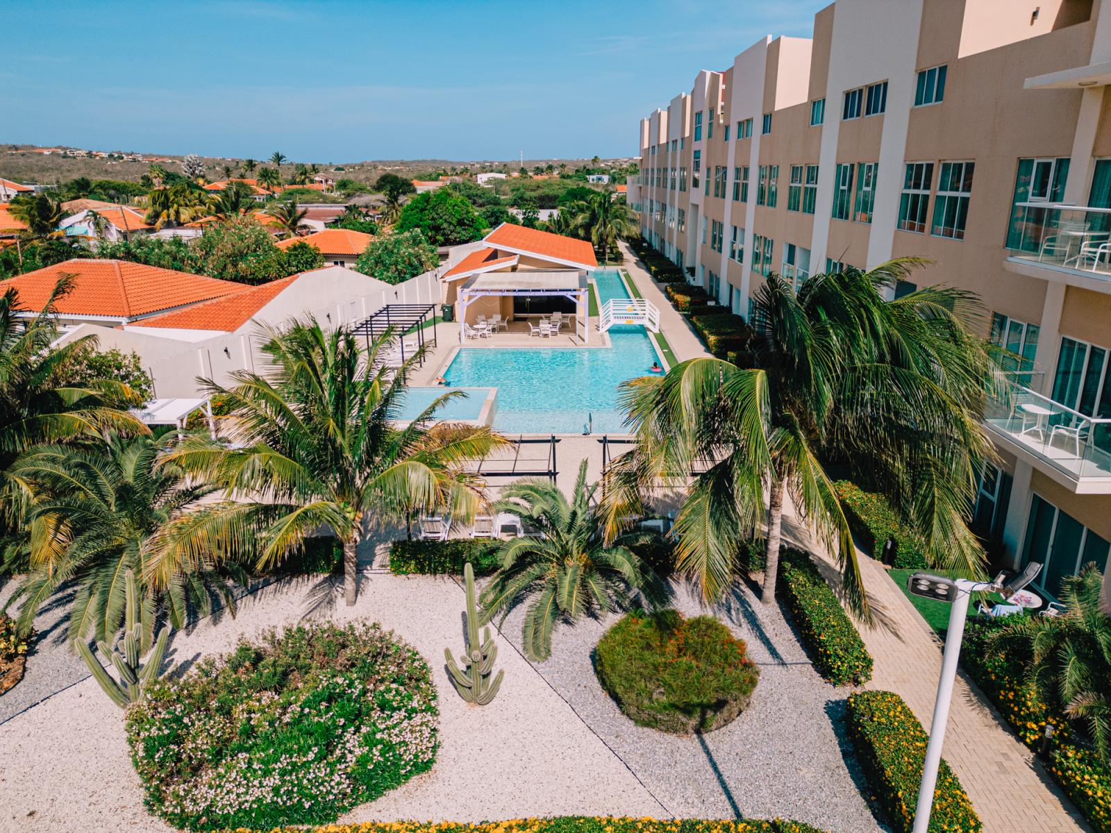 An abundance of greenery surrounding the pool