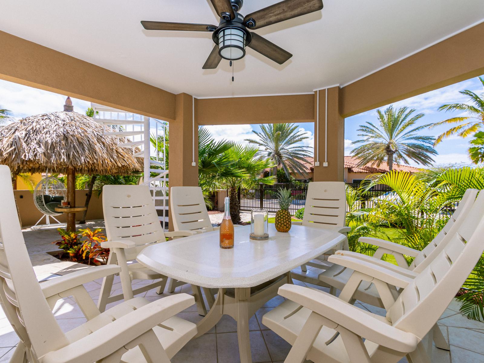 Elite outdoor dinning area of the 2BR Home in Noord Aruba - Beautiful 6 persons dinning - Majestically decored space with refreshing Atmosphere - Superbly sunbathed space - Outstanding pool facing dinning area - Beautiful views