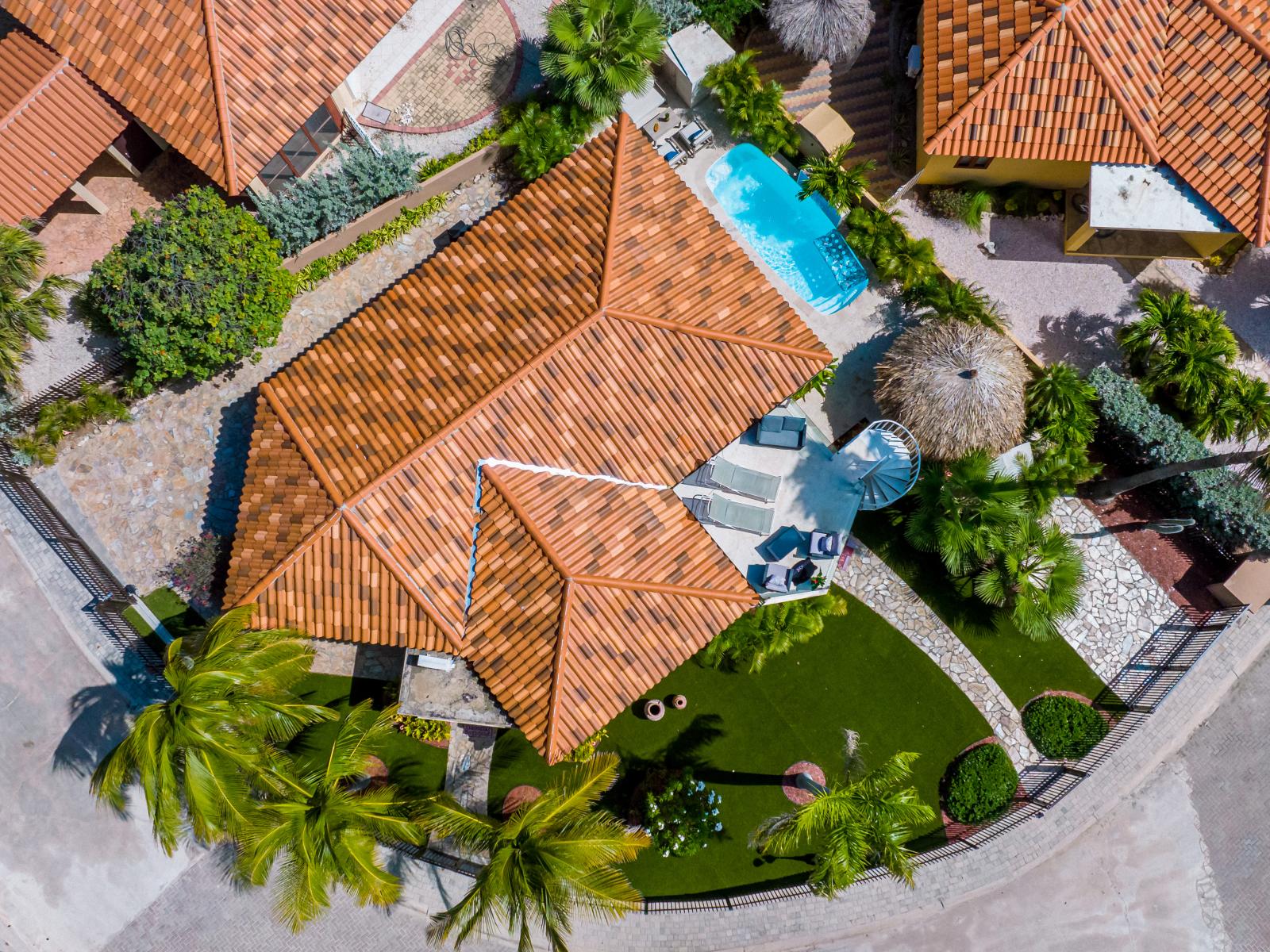 Experience a bird's-eye perspective of your tranquil haven, where every detail shines from above.