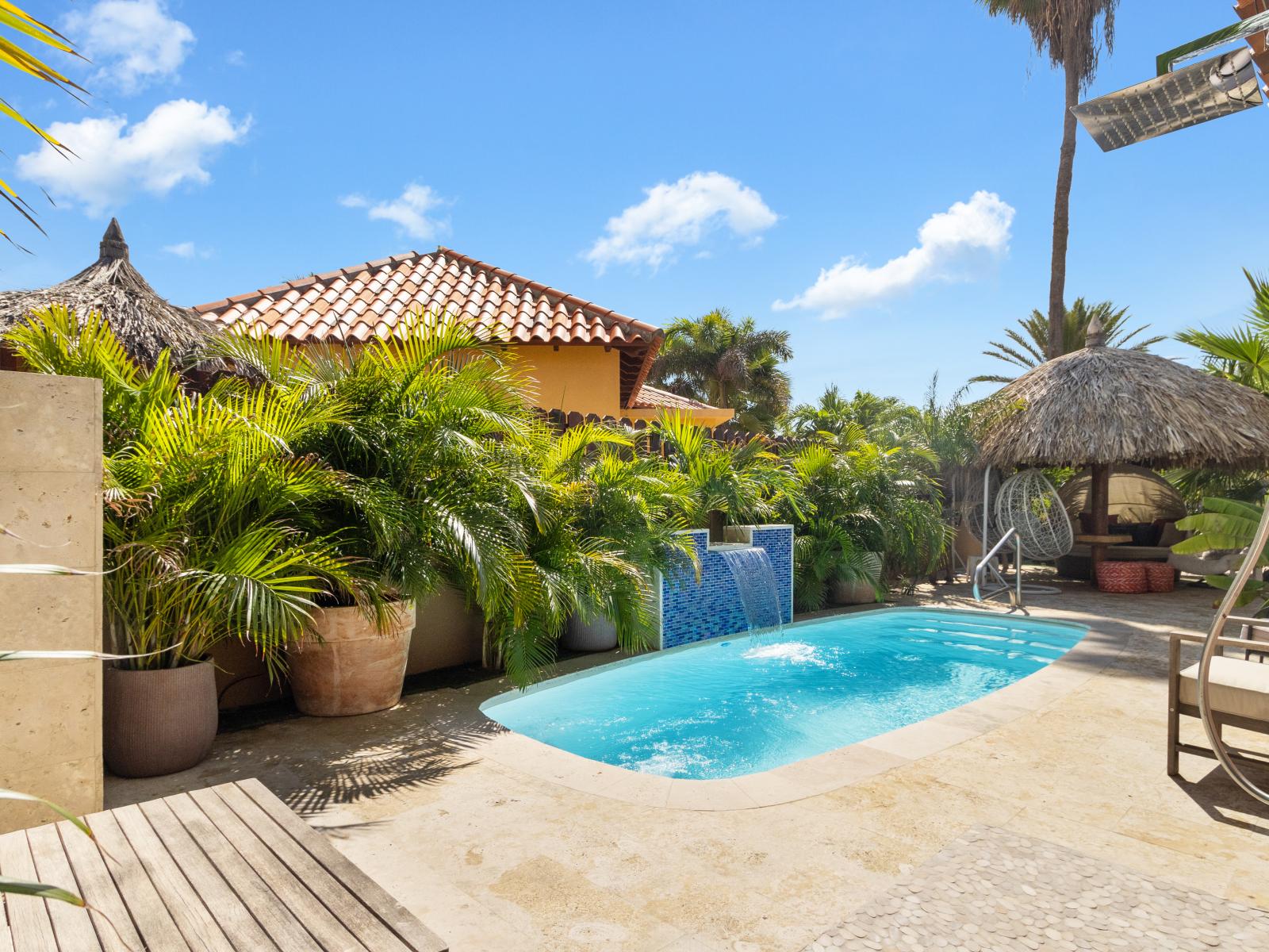 Splendid Private Pool of the 2BR Home in Noord Aruba - Cosy beach chairs available - Dive into refreshing poolside escape - Immerse yourself in the cool elegance of our pool - Experience ultimate relaxation in our poolside paradise