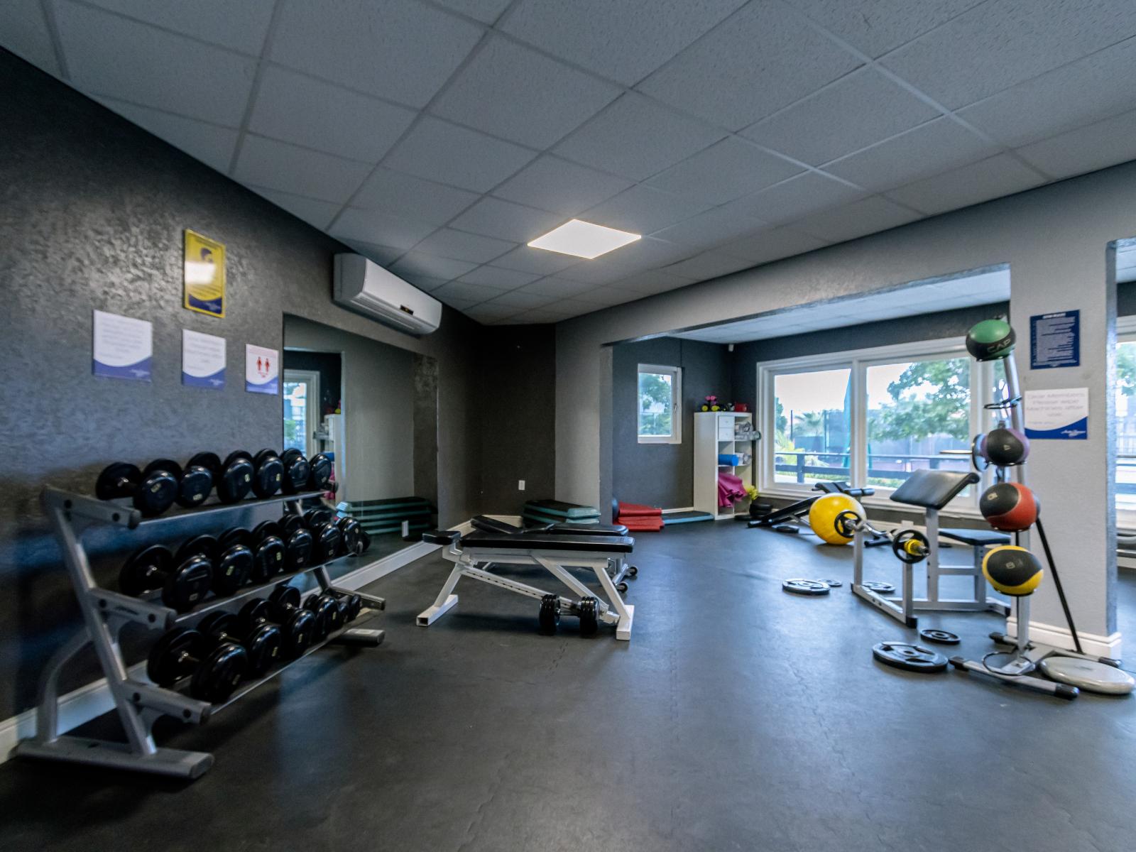 Stay active at Resort Fitness Center during your vacation. - Get your heart pumping in our state-of-the-art fitness facility at Resort. - Achieve your fitness goals while on vacation with our modern exercise equipment.