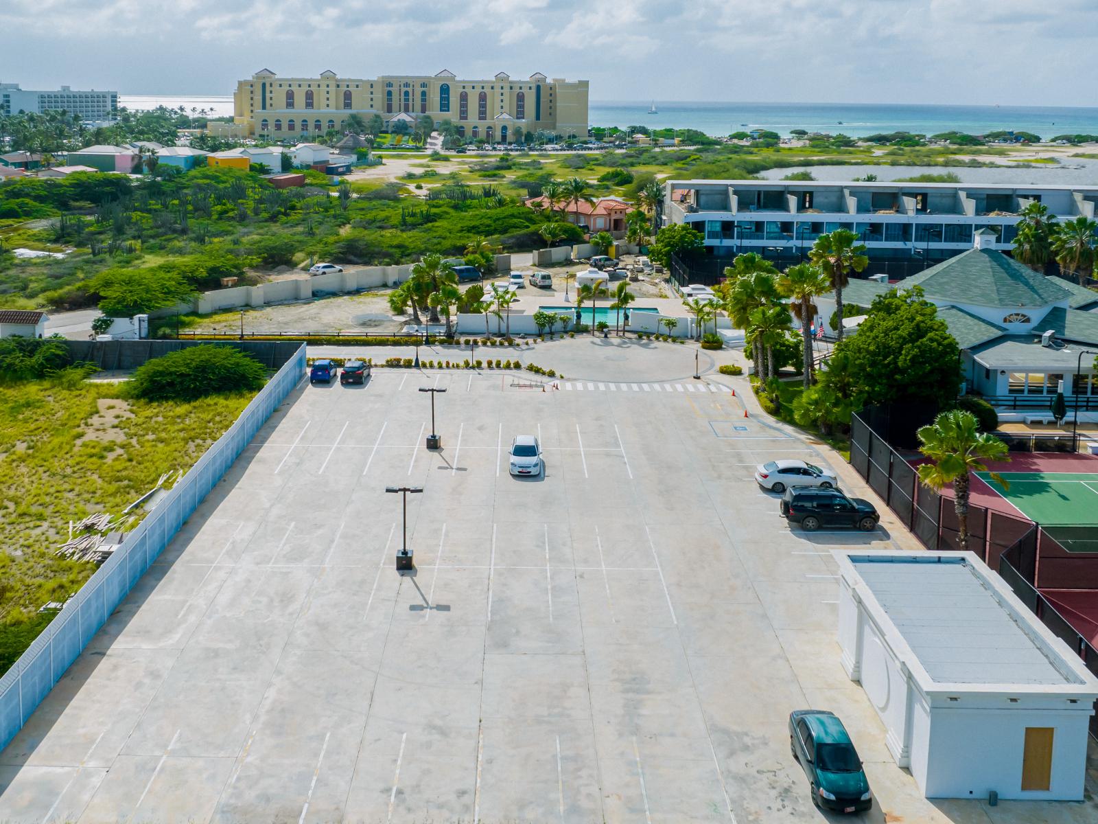 Rest assured with dedicated parking available during your stay. -  Experience the convenience of hassle-free parking at Aruba Racquet Club. - Start your Aruba adventure with stress-free parking right at your fingertips.