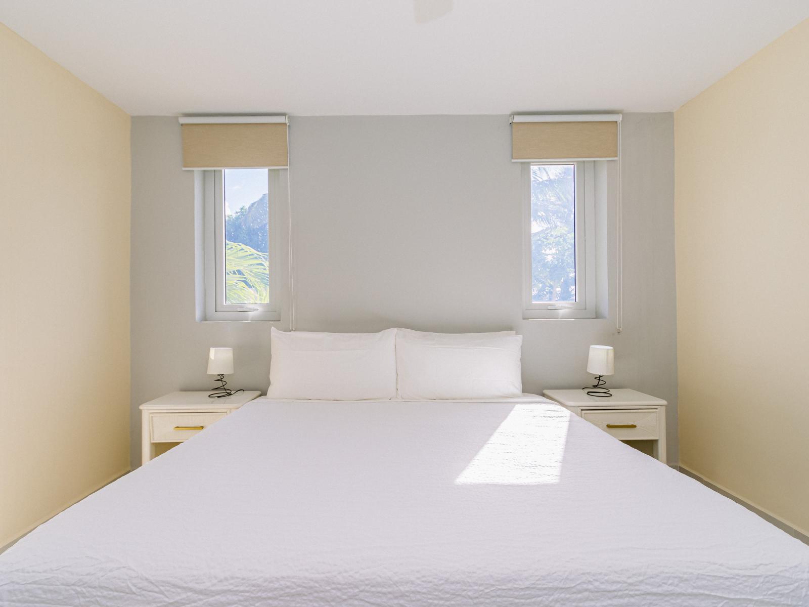 bedroom 2 offers an abundance of natural sun light and also has black out curtains for your convenience