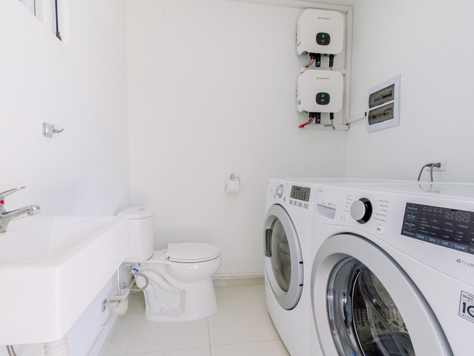 Convenience meets comfort: our laundry area is designed to make your stay feel like home