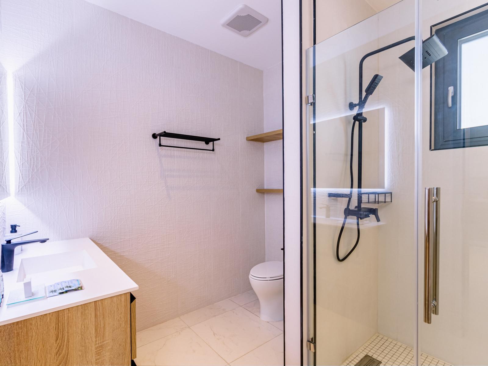 En-suite bathroom connected to bedroom 1 with a walk in shower