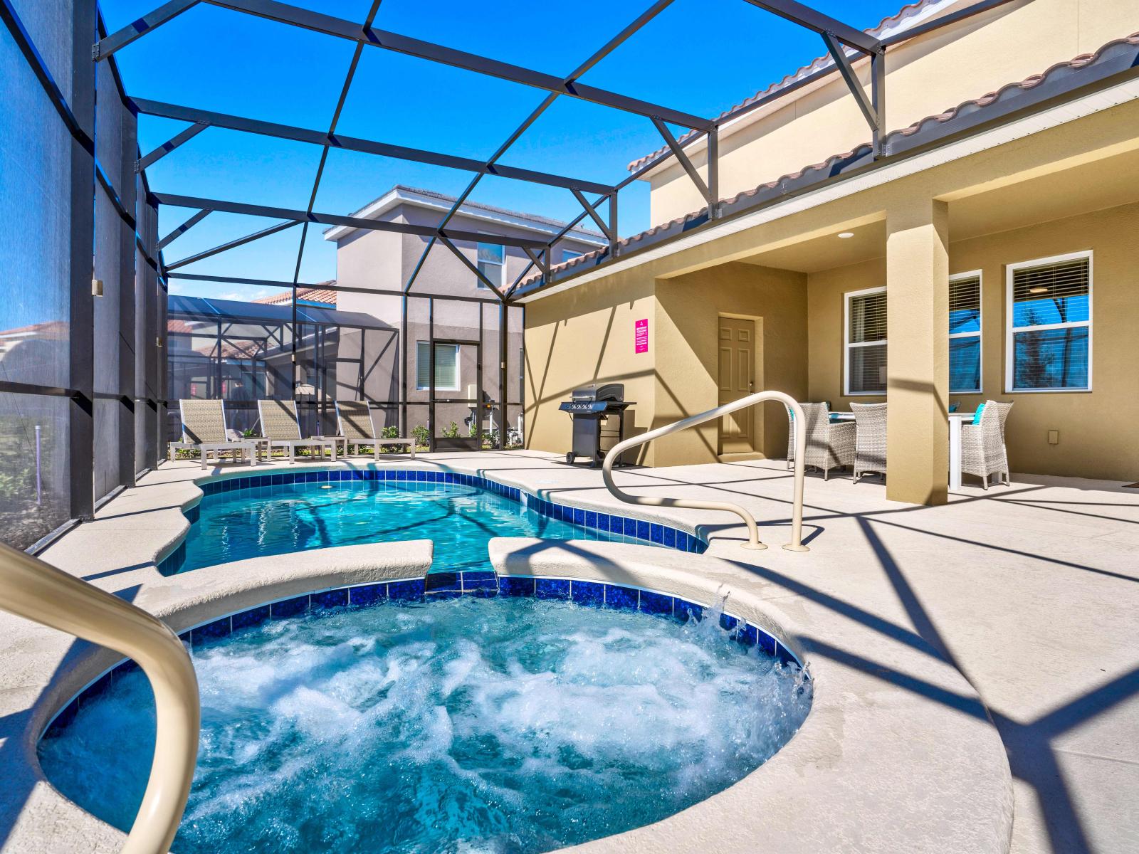 Amazing private pool of the home in Davenport Florida - A picturesque setting surrounded by palm trees and tropical blooms - A serene escape where you can unwind and rejuvenate in style