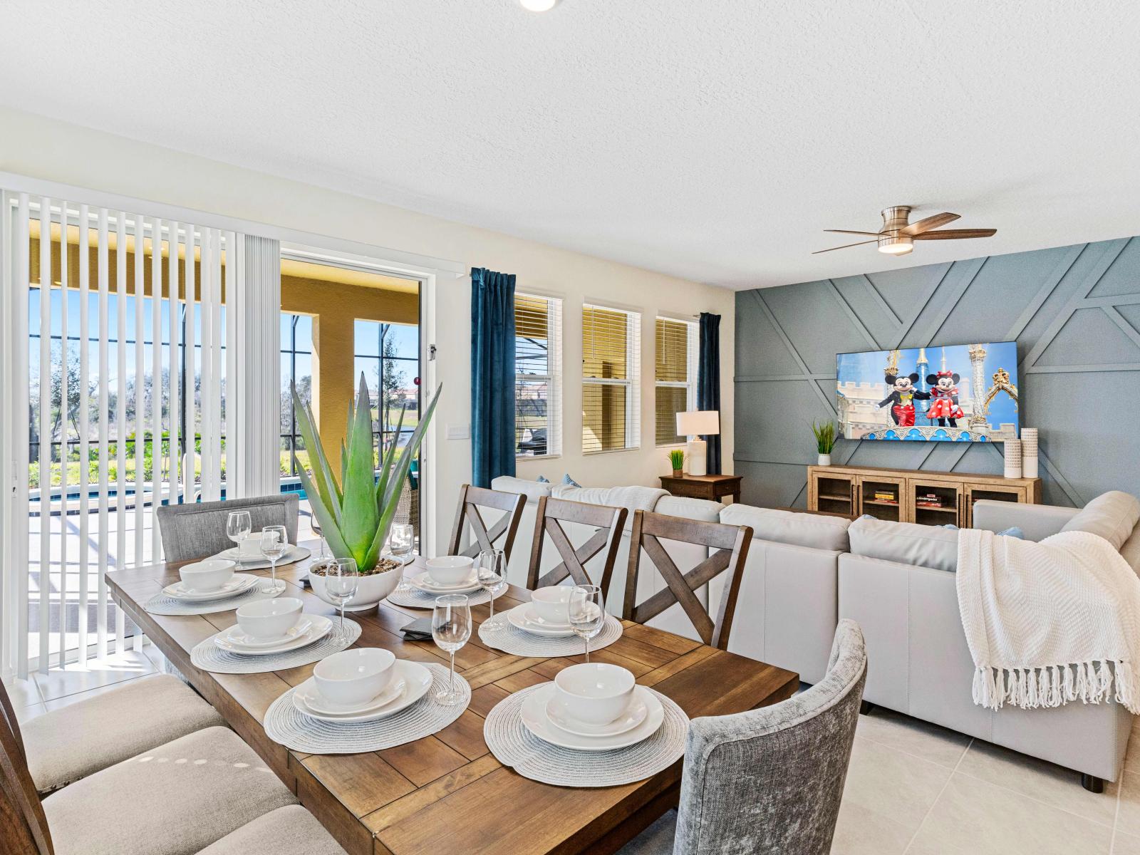 Magnificent home in Davenport Florida - Open-concept living area seamlessly connected to a stylish dining space - Stunning outside views - Plush seating arrangements invite relaxation and stylish gatherings - Smart TV for entertainment