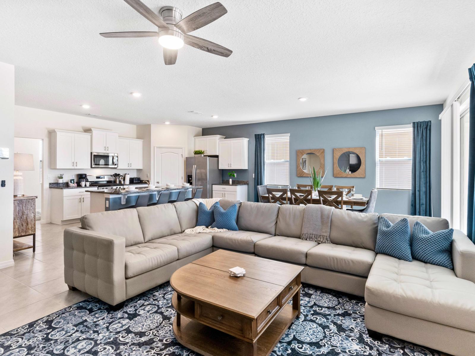 Welcoming living area of the home in Davenport Florida - Beautiful living room with an open layout, creating a sense of spaciousness - Stylish furniture arrangement providing comfort and a cohesive look - Plush sofas for relaxing seating