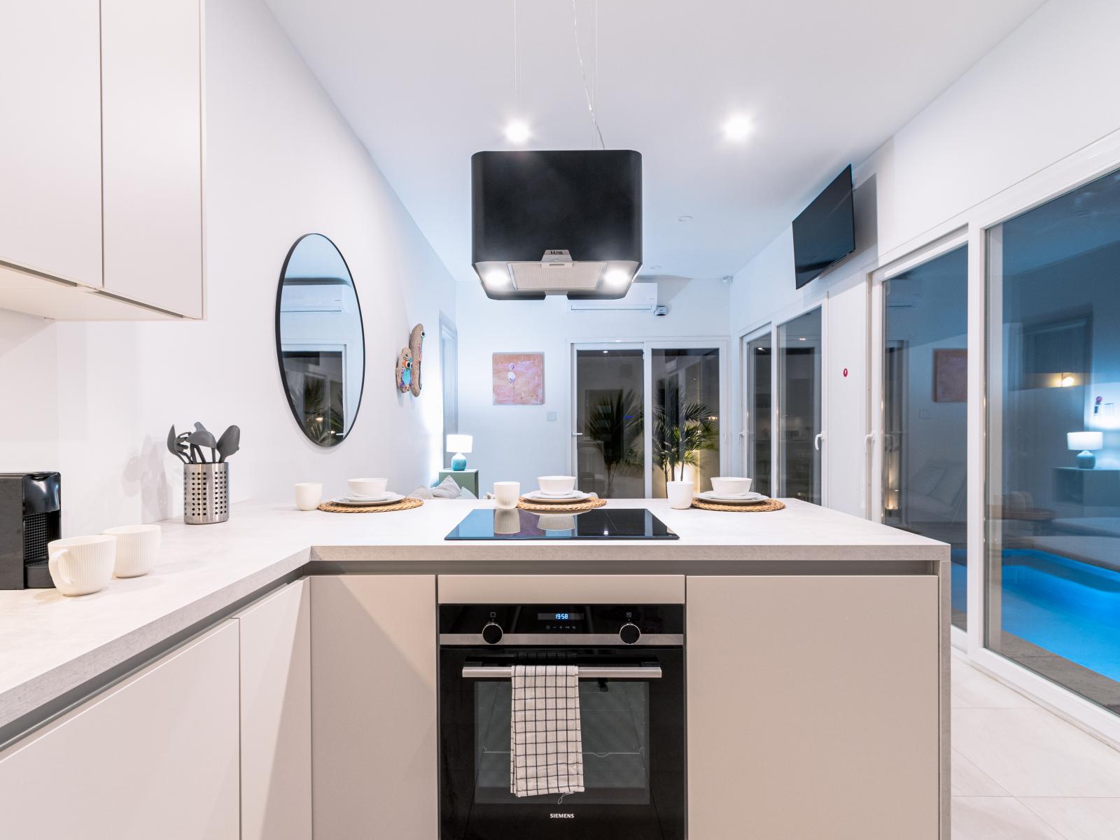 Polished Kitchen of the Home in Oranjestad Aruba - Fully Equipped - Plenty storage space for organized and clutter-free counters - Smart use of space with versatile storage solutions - Thoughtful placement of kitchen essentials for easy access