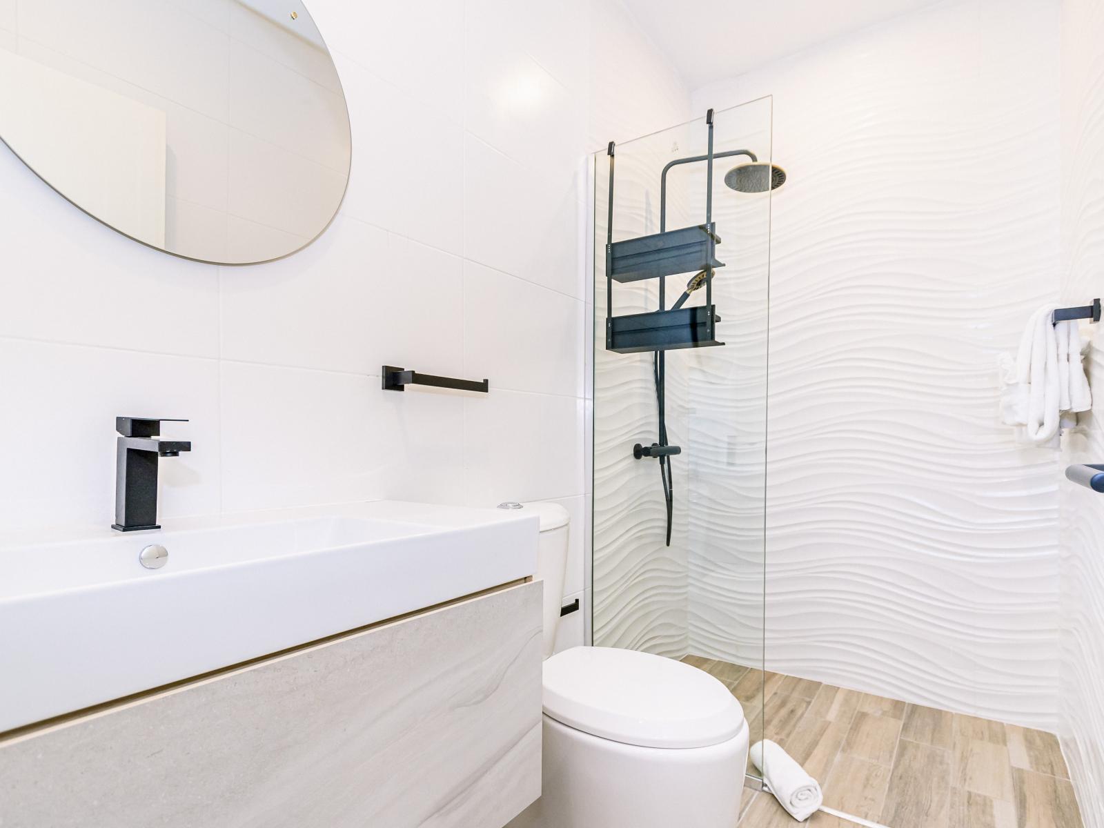 Experience luxury in Bathroom 2 with its contemporary design finishes, blending elegance and functionality seamlessly.