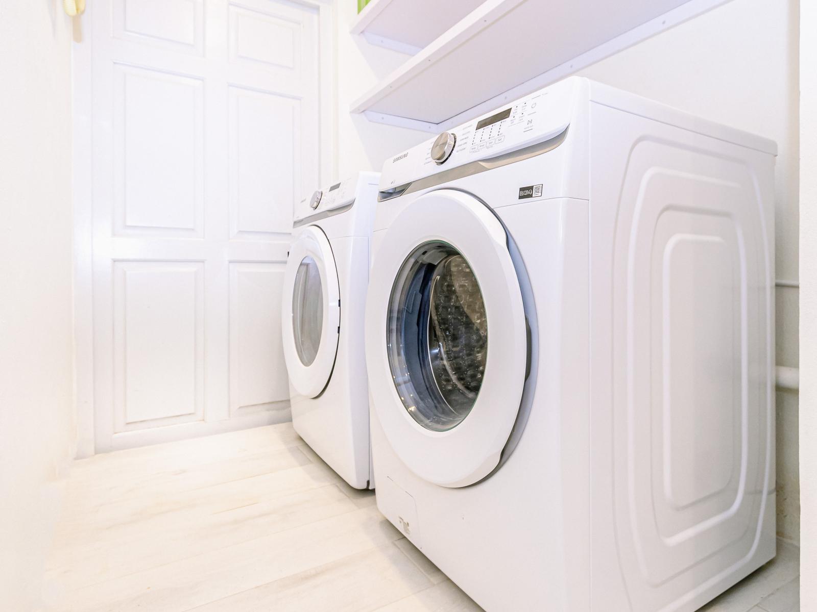 Convenience meets functionality in our laundry room, equipped with a washer and dryer for your laundry needs.