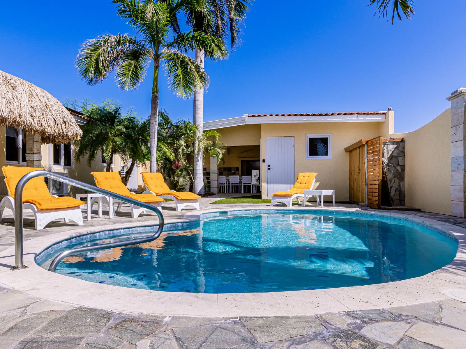 Enjoy a dip in our inviting pool, offering a refreshing escape from the heat.