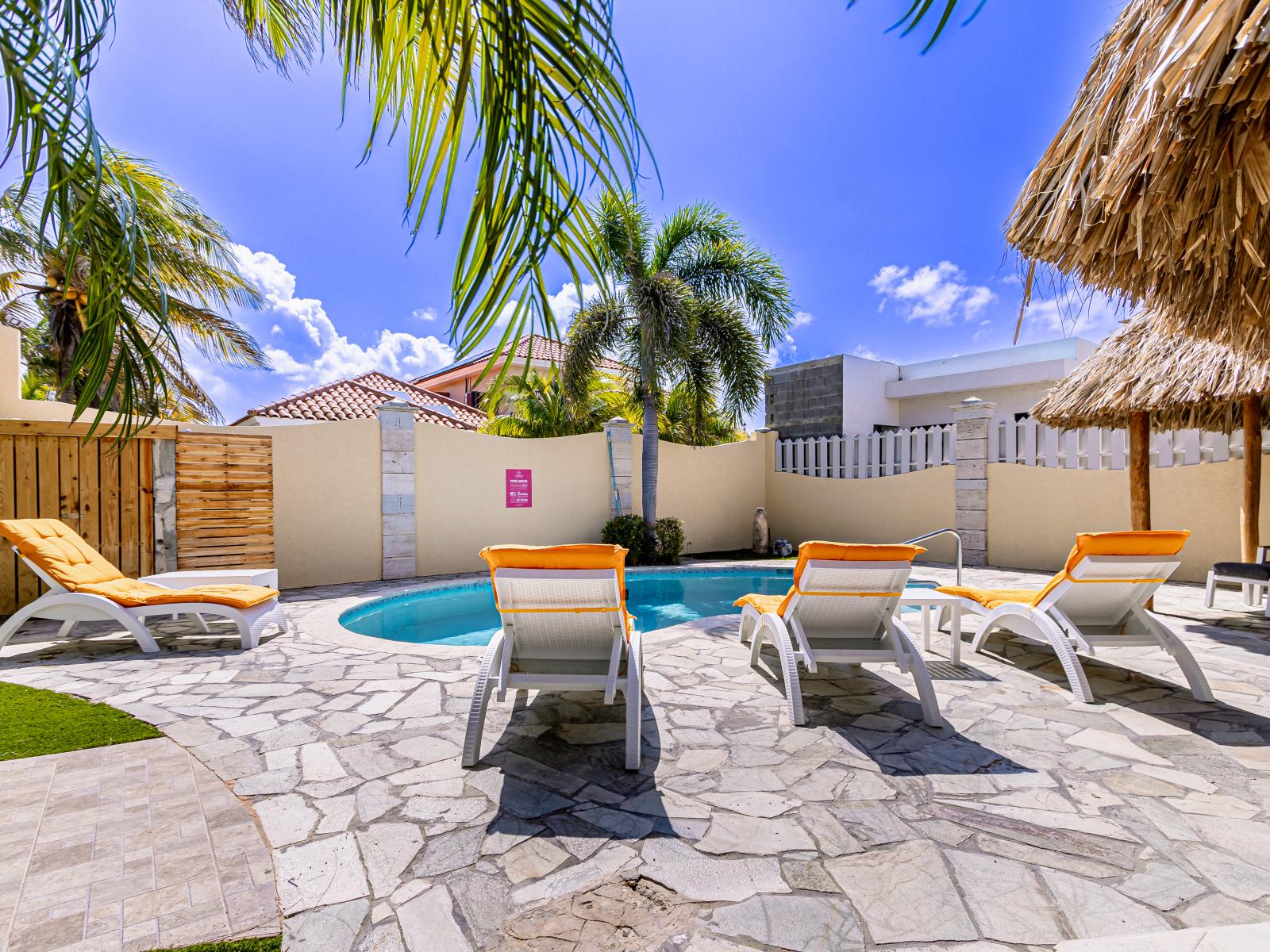 Indulge in leisurely moments by our poolside lounge chairs, offering comfort and relaxation with every sun-soaked hour.