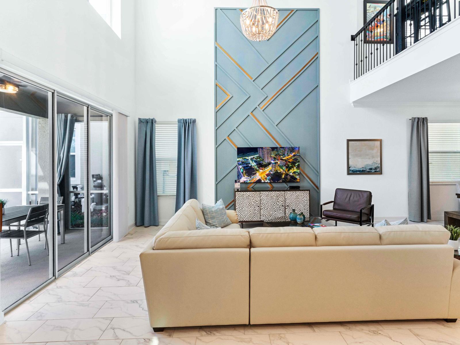 Elevated Living Area of the Townhouse in Davenport Florida - Chic and contemporary living room design with clean lines and modern furnishings Well-chosen lighting fixtures adding charm - Smart TV and Netflix