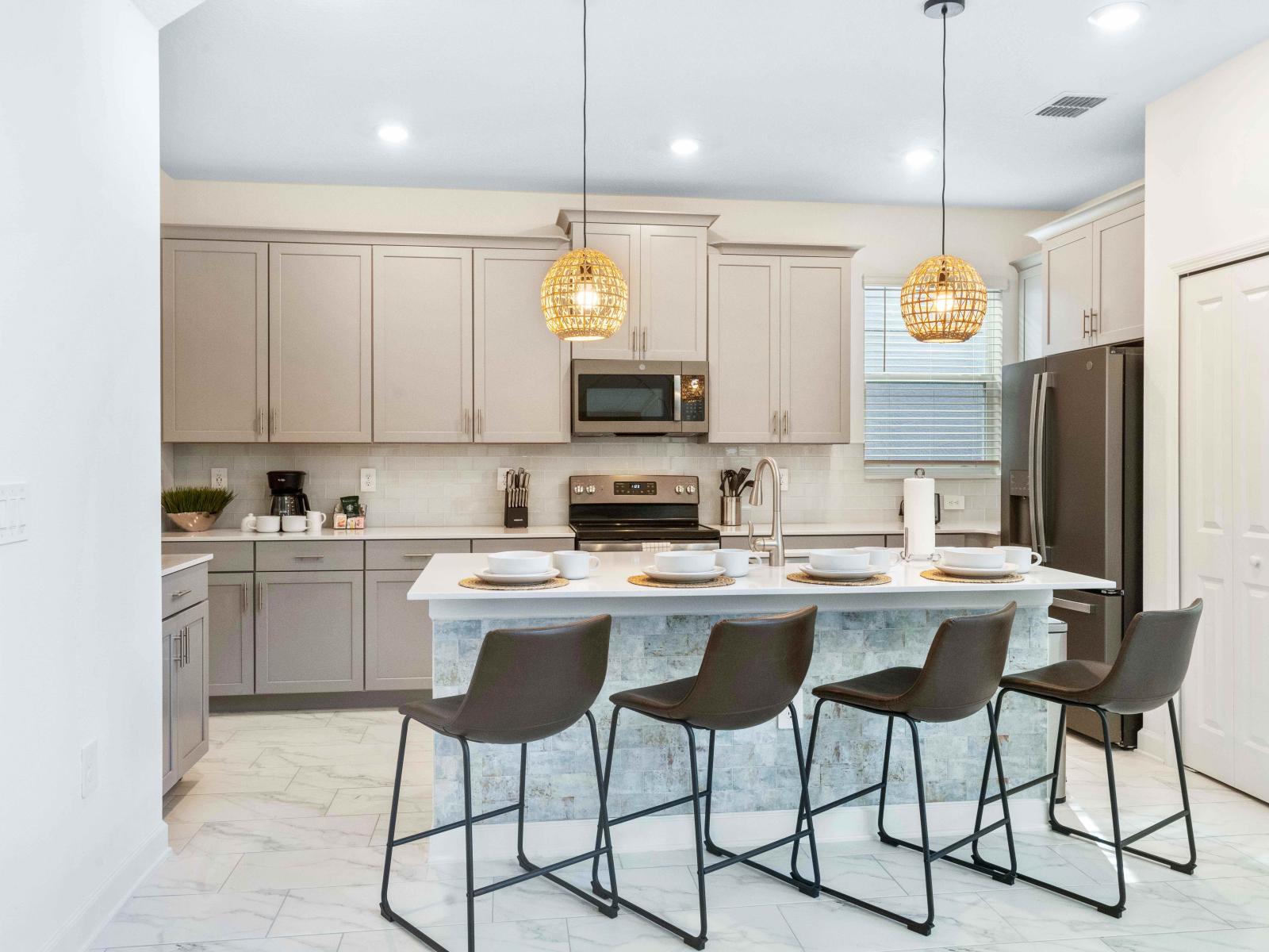 Lush Kitchen of the Townhouse in Davenport Florida - A fully Equipped kitchen where you can enjoy cooking and prepping your meals - Breakfast bar - High Chairs