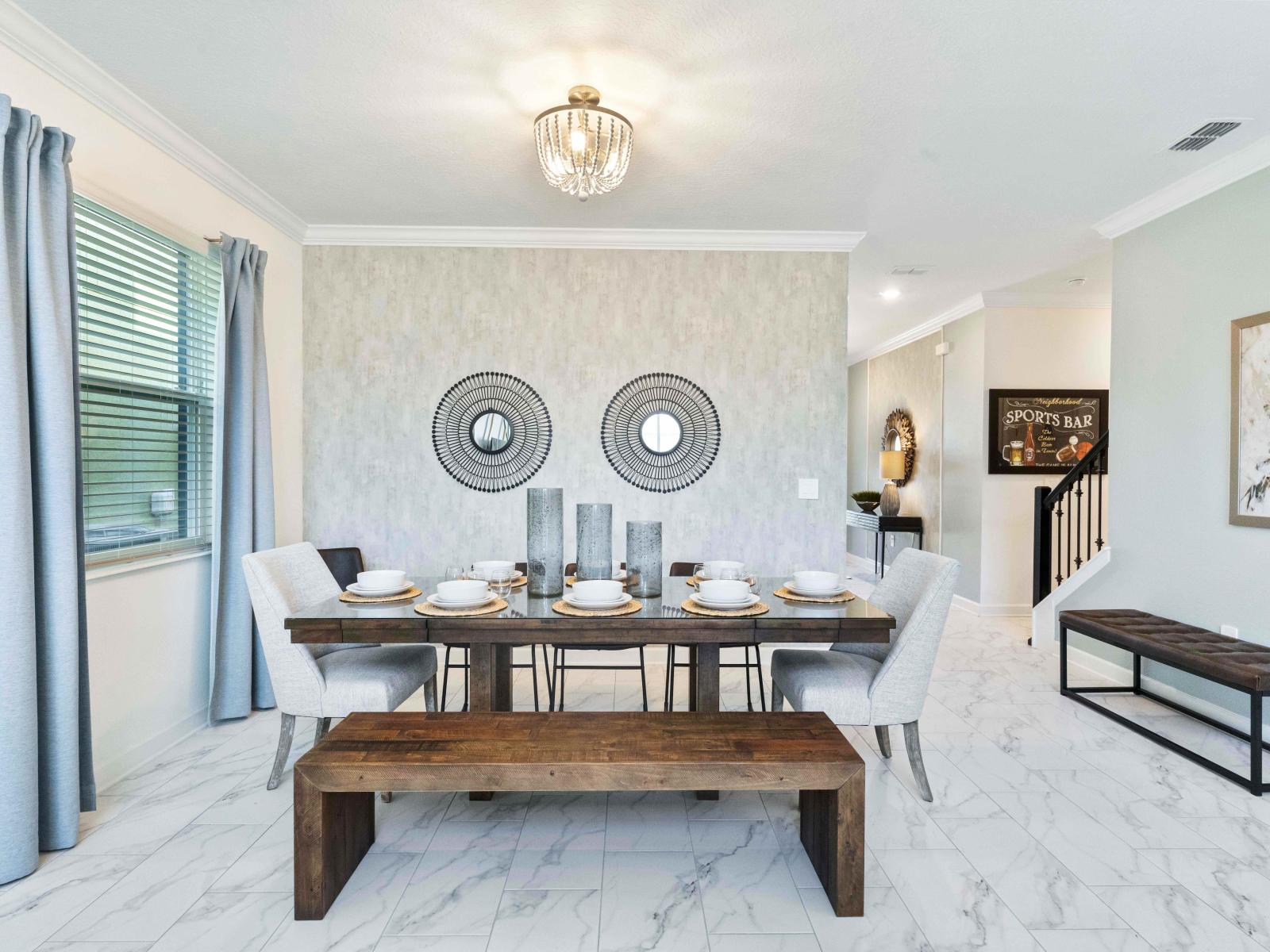 Stylish Dining Area of the Townhouse in Davenport Florida - The eight seater dining table - Fronting the living area and kitchen which is an easy access to serve your food - Elegant Decor