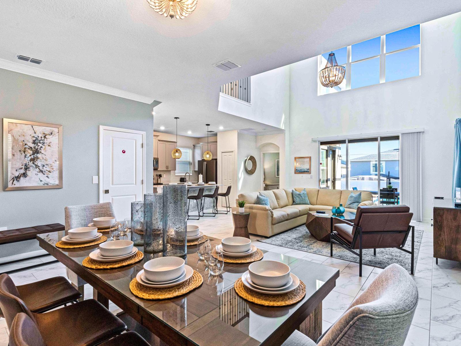 Charming Townhouse in Davenport Florida - High Ceiling with large windows - Open layout seamlessly connecting the dining area to the kitchen or living room - Customized decor reflecting a sophisticated design sensibility