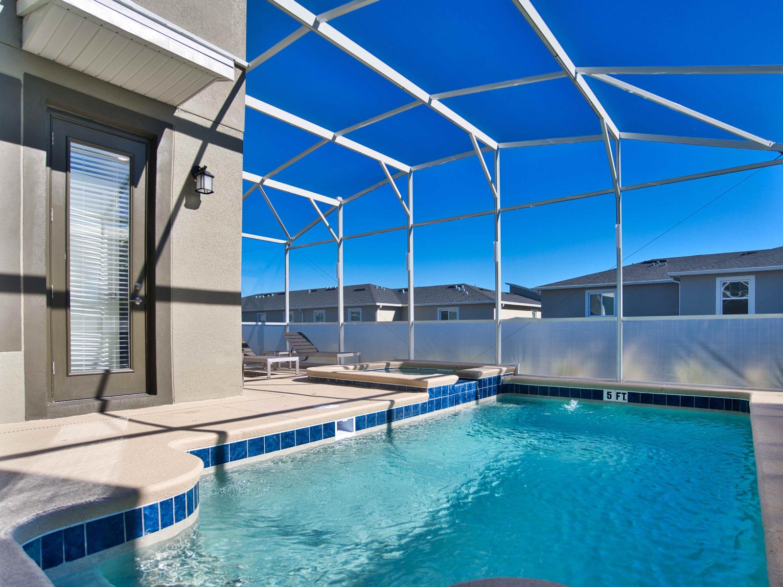 Splendid Private Pool Area of the Townhouse in Davenport Florida - Bask in the glory of outdoor swimming pool - Every moment is a picture-perfect escape - Complemented by cozy lounge chairs for your utmost comfort