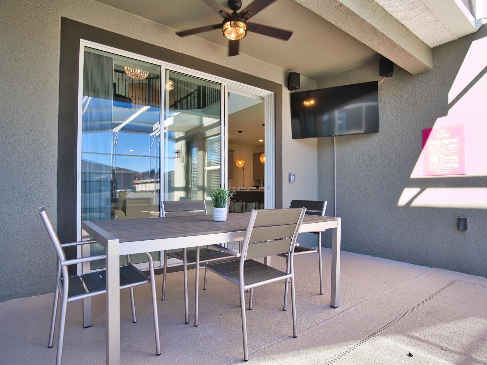 Pleasant Outdoor Dining Area of the Townhouse in Davenport Florida - Savor the flavors of paradise with a side of poolside serenity - Outdoor dining experience offers a feast for the senses - Every meal accompanied by stunning pool views