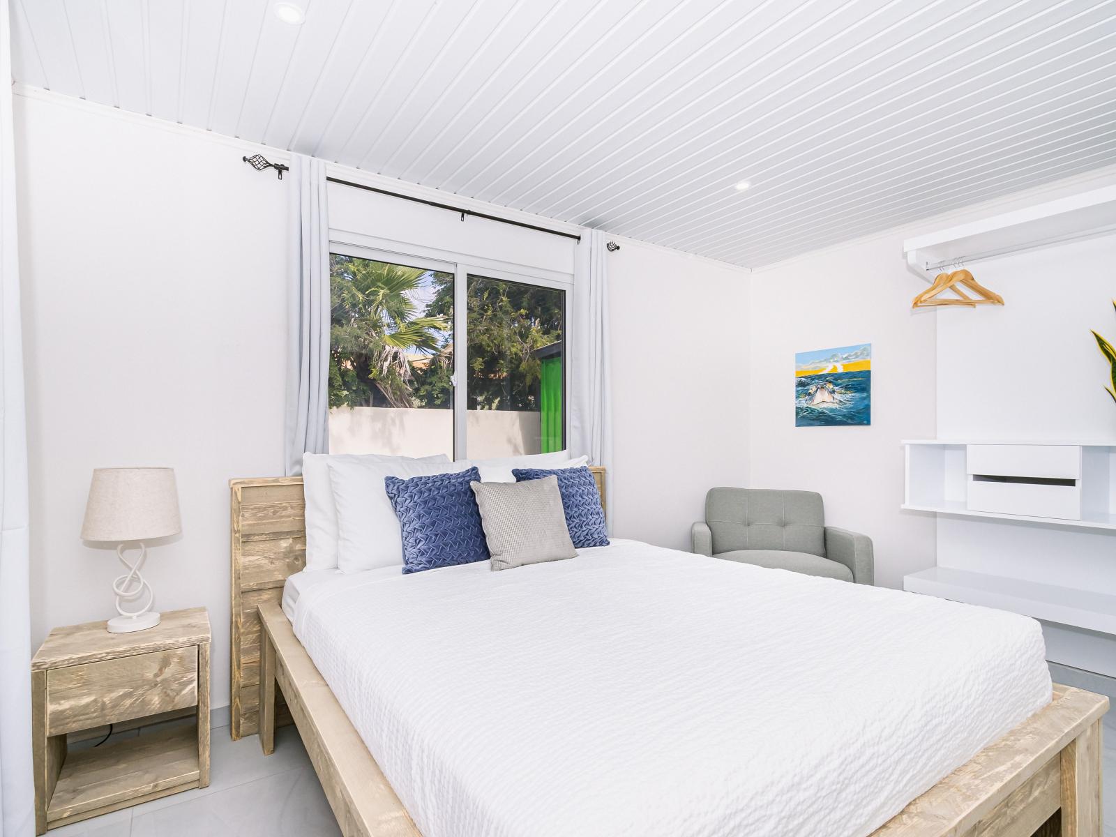 Wake up to sunshine in Bedroom 2, where abundant natural light floods the space, creating a warm and inviting atmosphere. Embrace the beauty of each day as sunlight dances through the room.