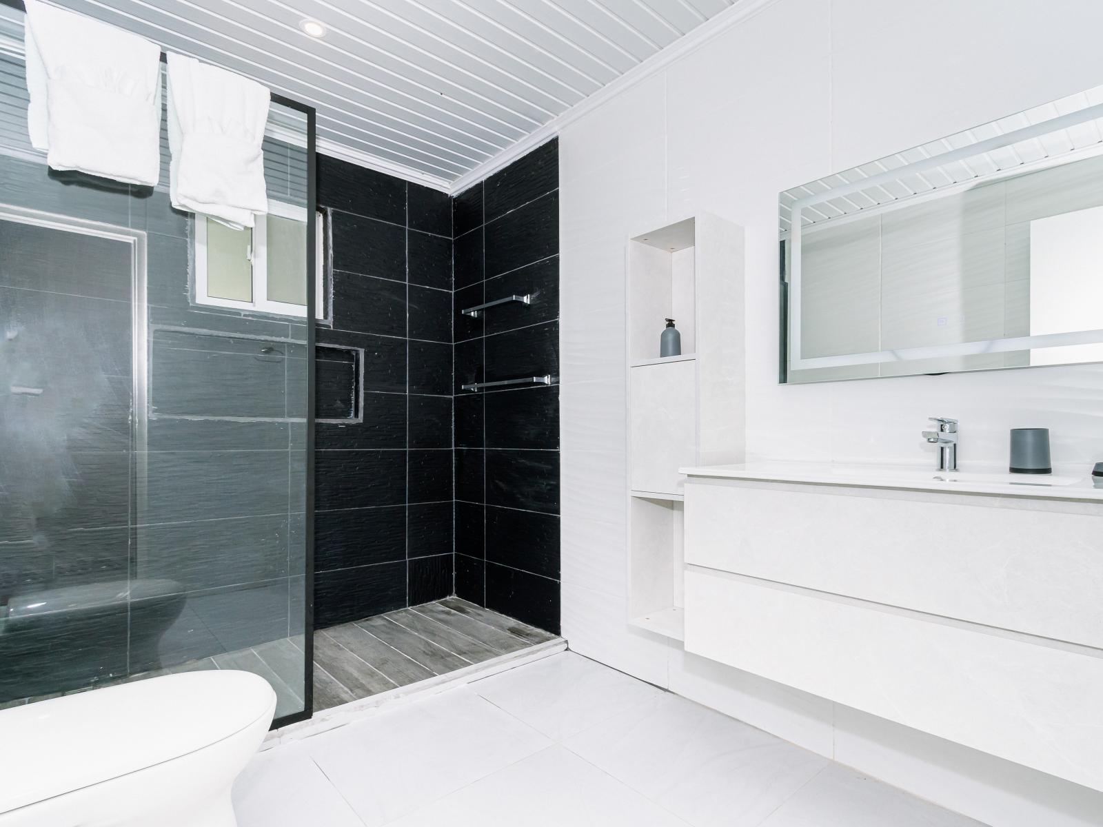 Refresh and rejuvenate in the luxurious walk-in shower of Bathroom 3!