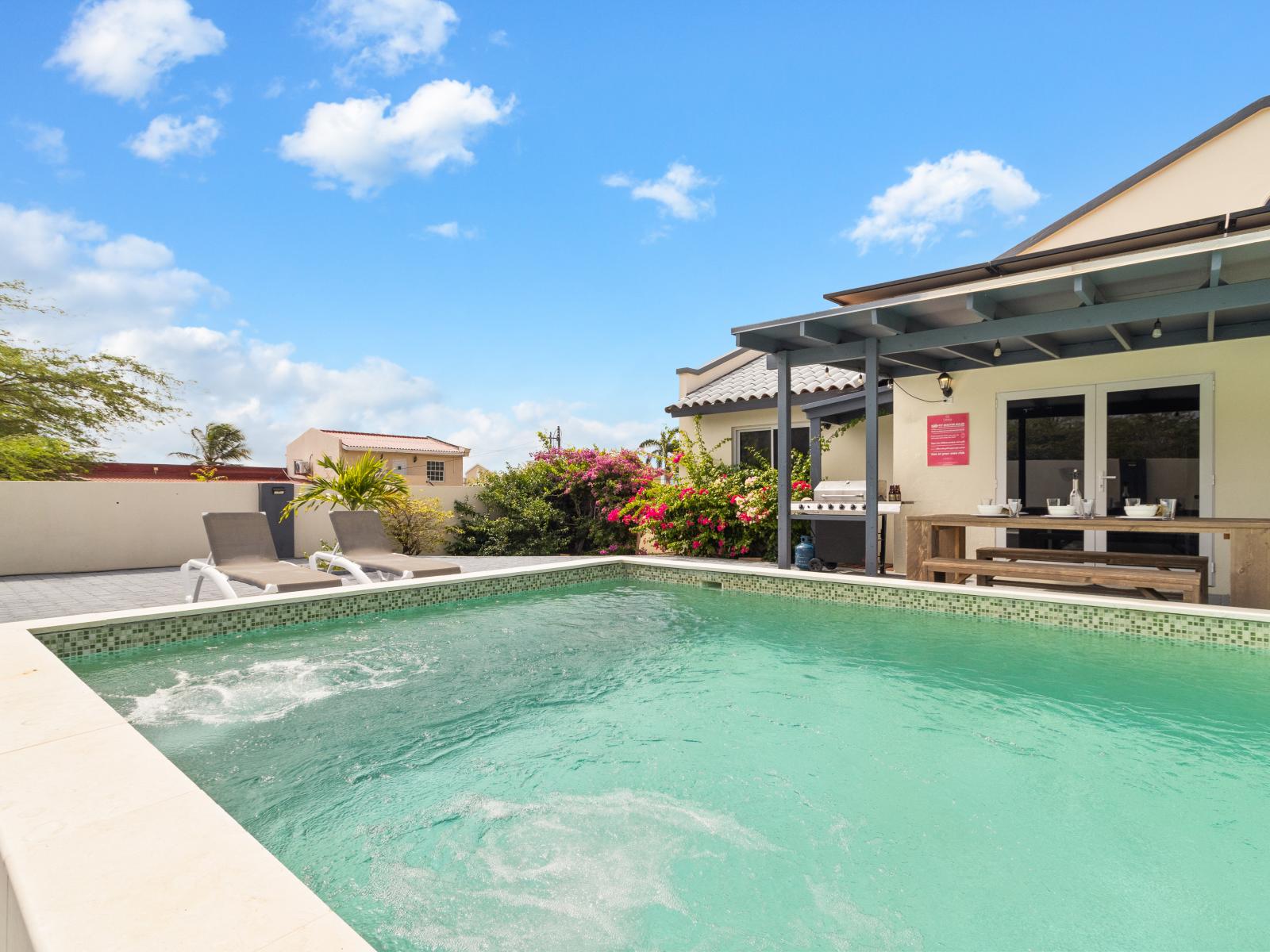 Dive into pure relaxation in our refreshing pool, your oasis of calm and rejuvenation!