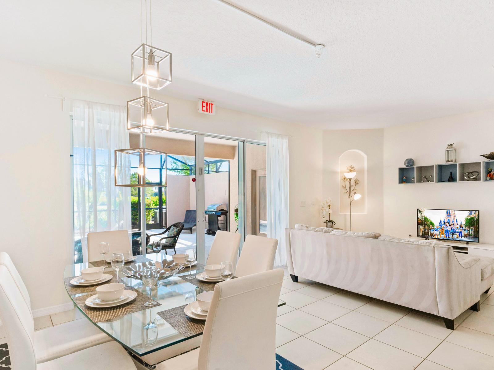 Outstanding townhouse in Davenport Florida - Cozy seating area conducive to relaxation and socializing - Open-concept living area seamlessly connected to a stylish dining space - High-end finishes and refined details