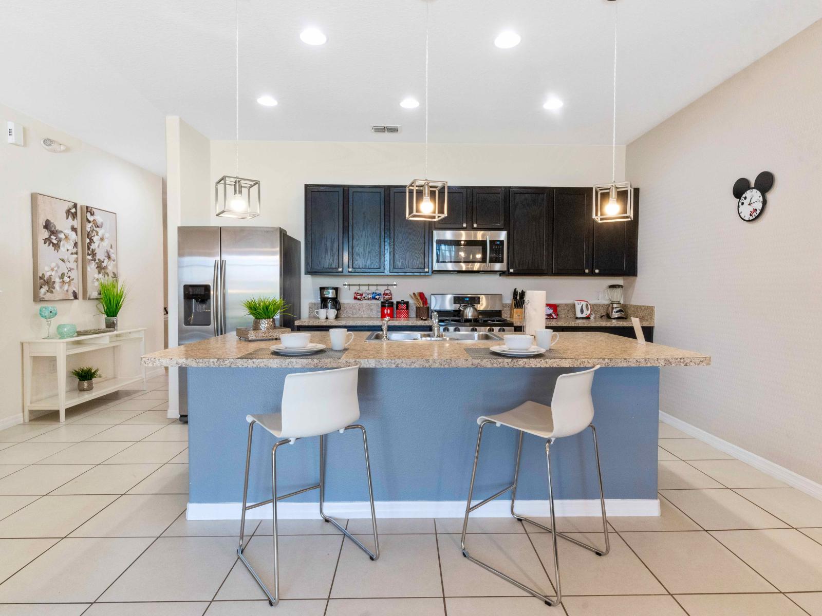 Inviting kitchen of the townhouse in Davenport Florida - Well-lit workspace with strategically placed task lighting - Quality materials, such as granite or quartz countertops