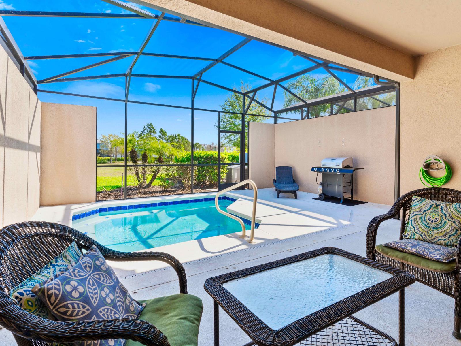 Inviting private screened-in lanai, perfect for entertaining and relaxing; complete with cozy patio furniture, a deluxe outdoor dining table and your very own swimming pool.