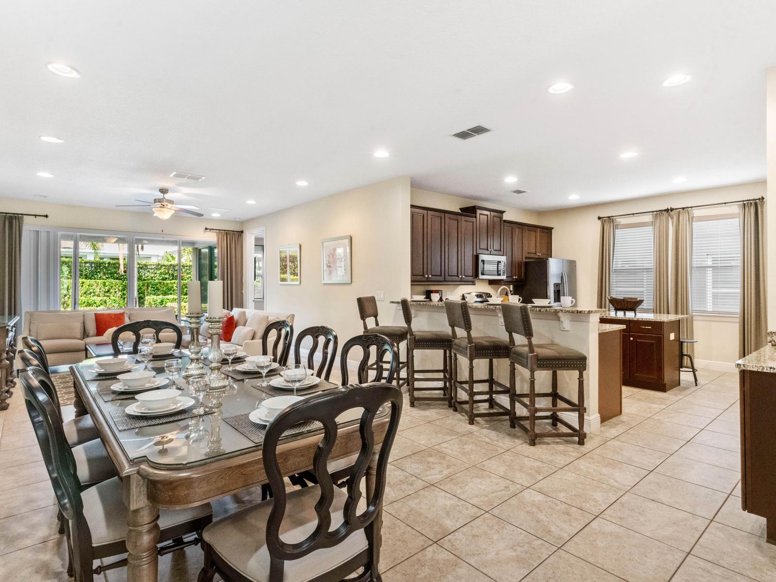 Elegant Dining and Kitchen of the Home in Kissimmee Florida - Perfect blend of elegance and functionality - 8 Persons Dining - Open concept connecting the kitchen to the dining