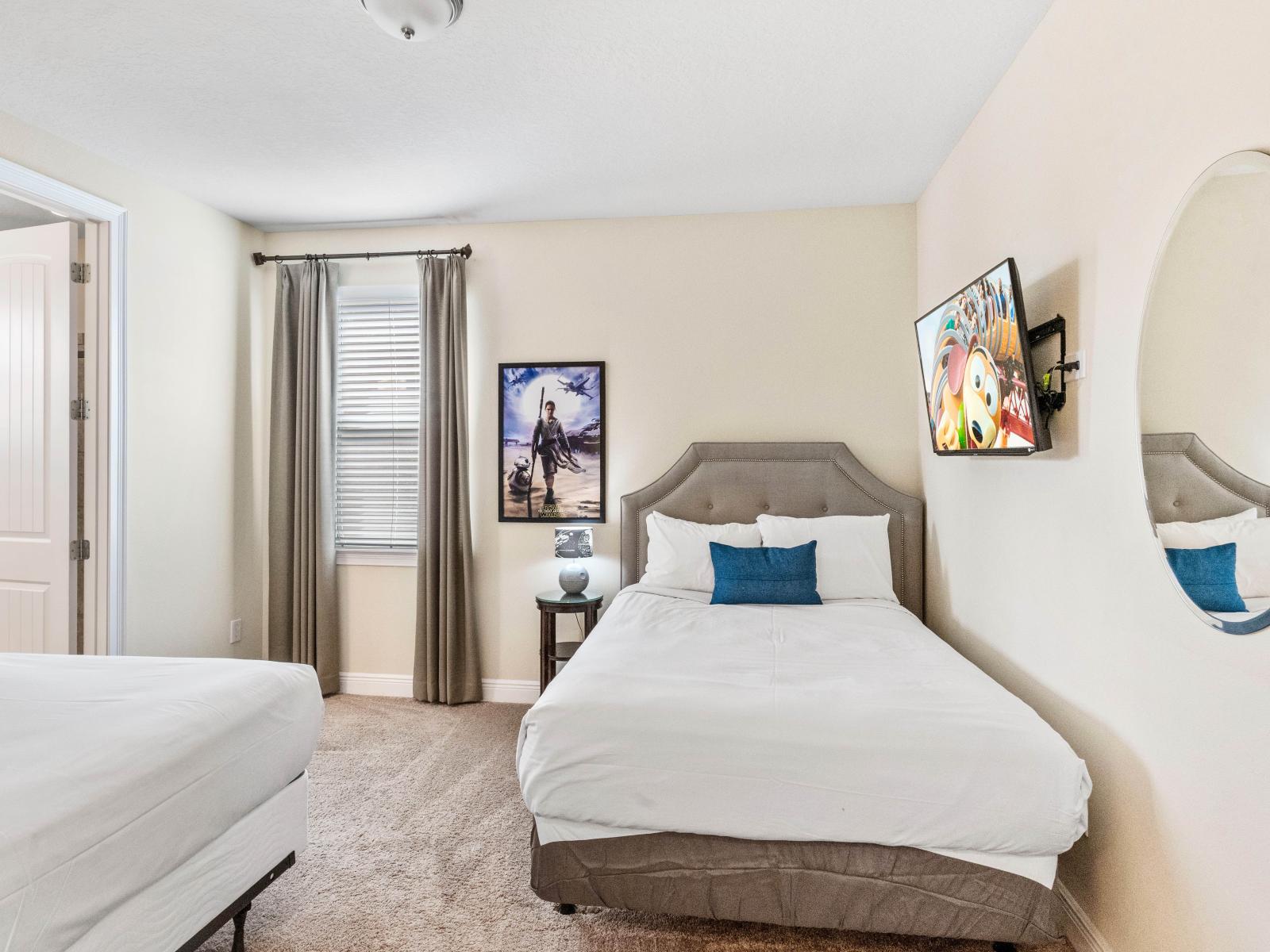 Elegant Bedroom of the Home in Kissimmee Florida - Enjoy the serenity of bedroom with dual beds - Offering a peaceful retreat for a good night's sleep - Smart TV and Netflix - Stylish round shape mirror