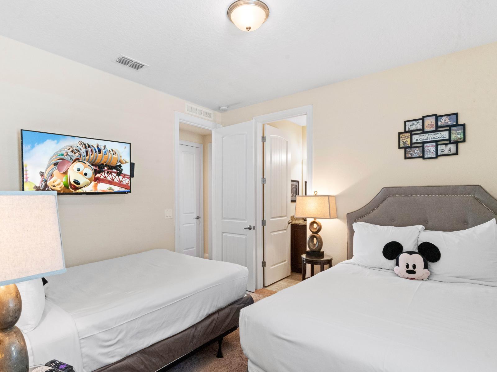 Lush Bedroom of the Home in Kissimmee Florida - Inviting bedroom featuring two double beds  - Smart TV and Netflix - A serene space where you can escape