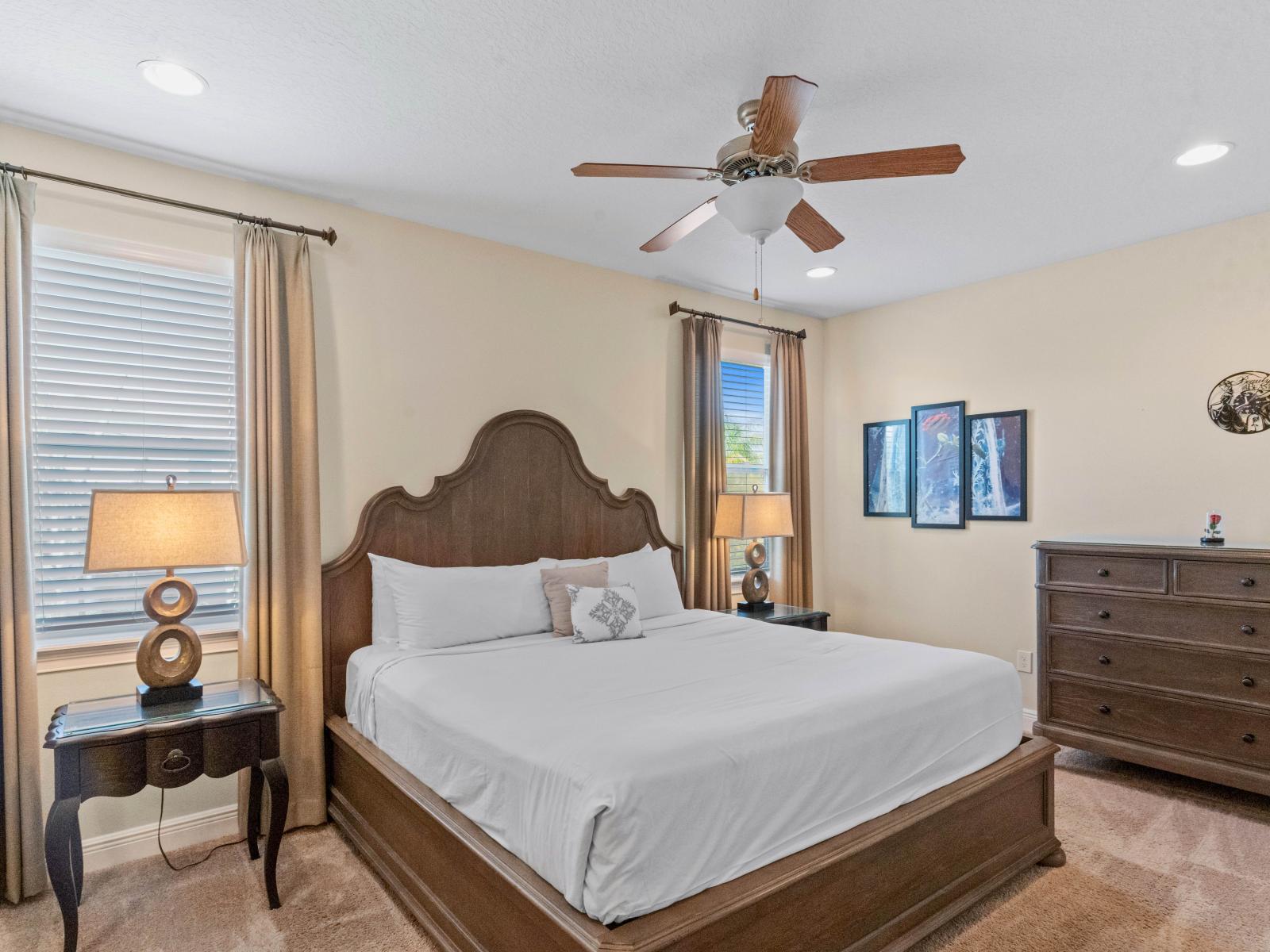 Luxury Bedroom of the Home in Kissimmee Florida - Unparalleled Comfort and Elegance - Cozy retreat with a plush double bed, perfect for relaxation - Stunning views from the bedroom window