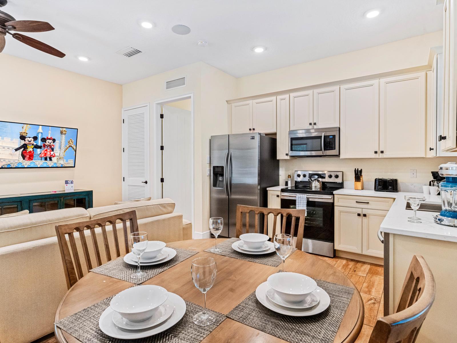 Kitchen/Dining Area - Stainless Steel Appliances - This kitchen is both functional and beautiful. Surprise your loved ones by preparing their favorite and  delicious meal.