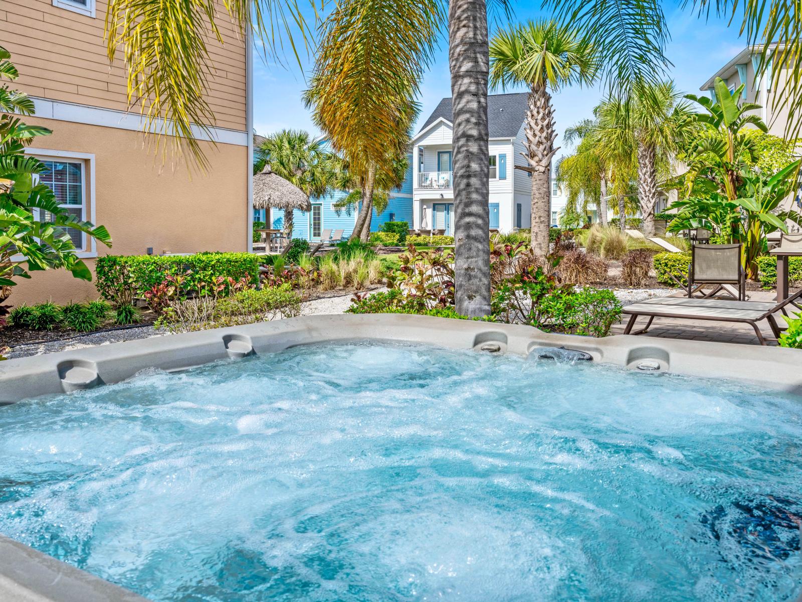 Outdoor jacuzzi of the cottage in Kissimmee Florida - Rejuvenate and unwind in the inviting jacuzzi tub on the patio - Offering you a serene oasis for ultimate relaxation and comfort