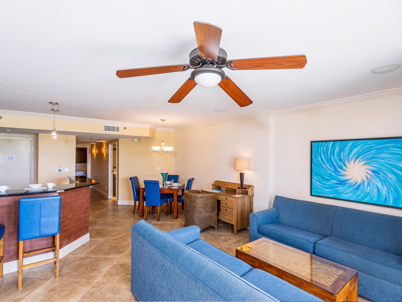 Charming Living Area of the condo in Noord Aruba - Stylish furniture arrangement providing comfort and a cohesive look - Comfy Sofas - Cozy seating area conducive to relaxation and socializing - Smart TV and Netflix  - Access to balcony