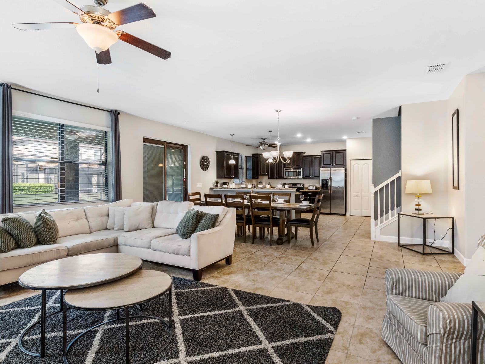 The Living room's  generous seating arrangements, open layouts, and abundant natural light, it offers a welcoming environment where guests can gather, socialize, and enjoy quality time together, making cherished memories during their stay.