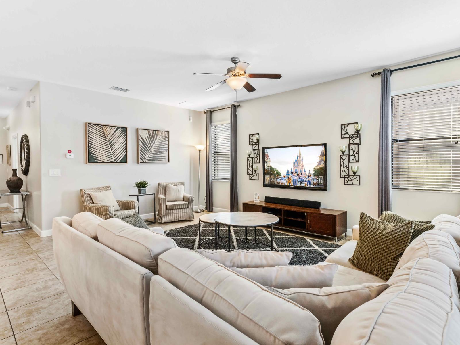 The living room features a flat-screen TV, making it the entertainment central for guests to unwind and enjoy their favorite shows and movies.