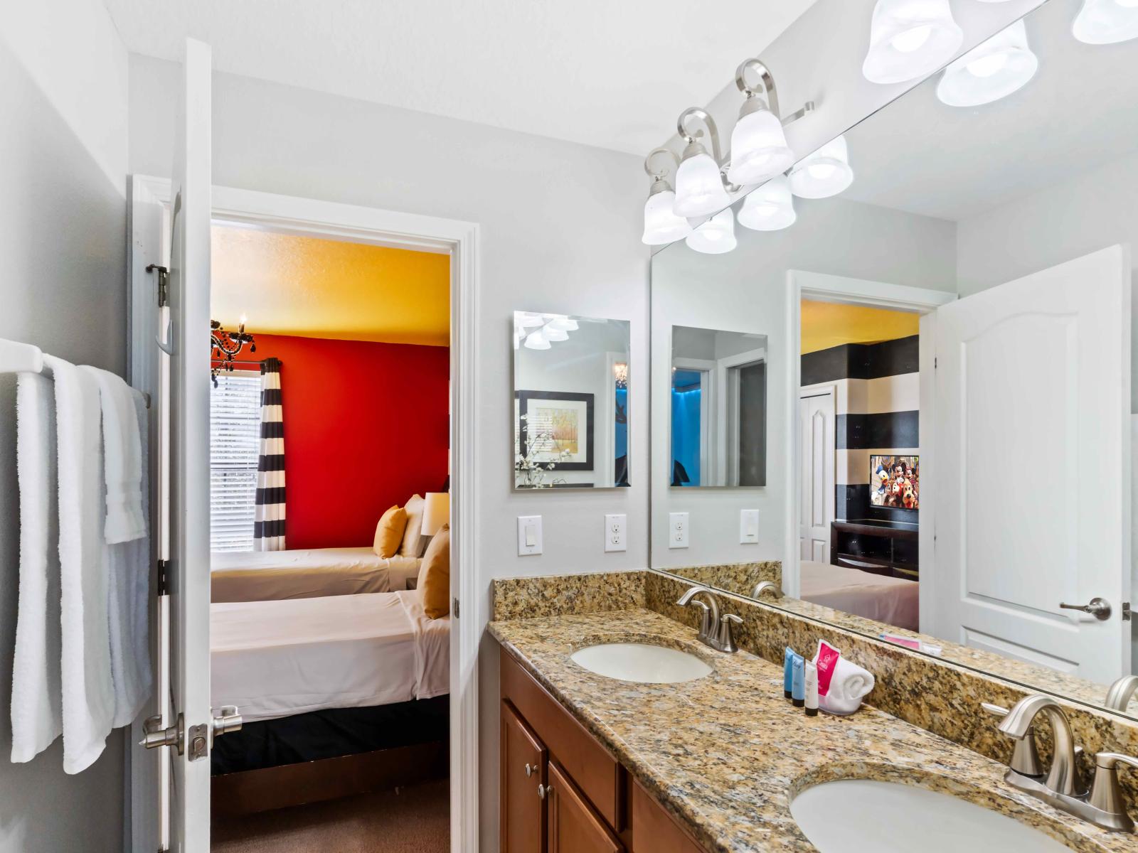 The vanity space in the bathroom is a personal grooming sanctuary.