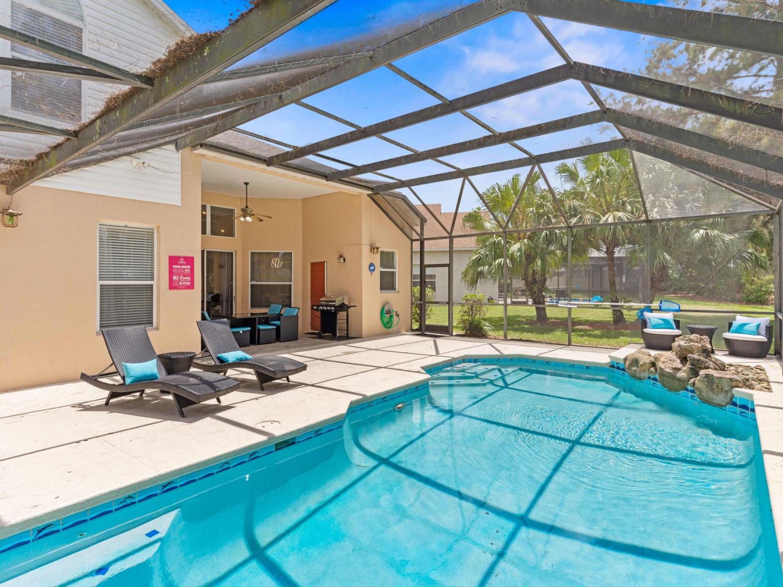 Amazing Shared Pool of the Apartment in Kissimmee - Cosy beach chairs available - Dive into refreshing poolside escape - Immerse yourself in the cool elegance of our pool - Experience ultimate relaxation in our poolside paradise