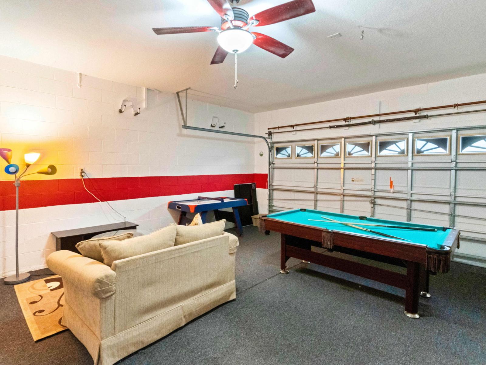 Level up your vacation experience at apartments Game Room fun for all ages! - From classic arcade games to modern consoles, our game room of apartment has it all. - Create unforgettable memories with friends in our spacious game room