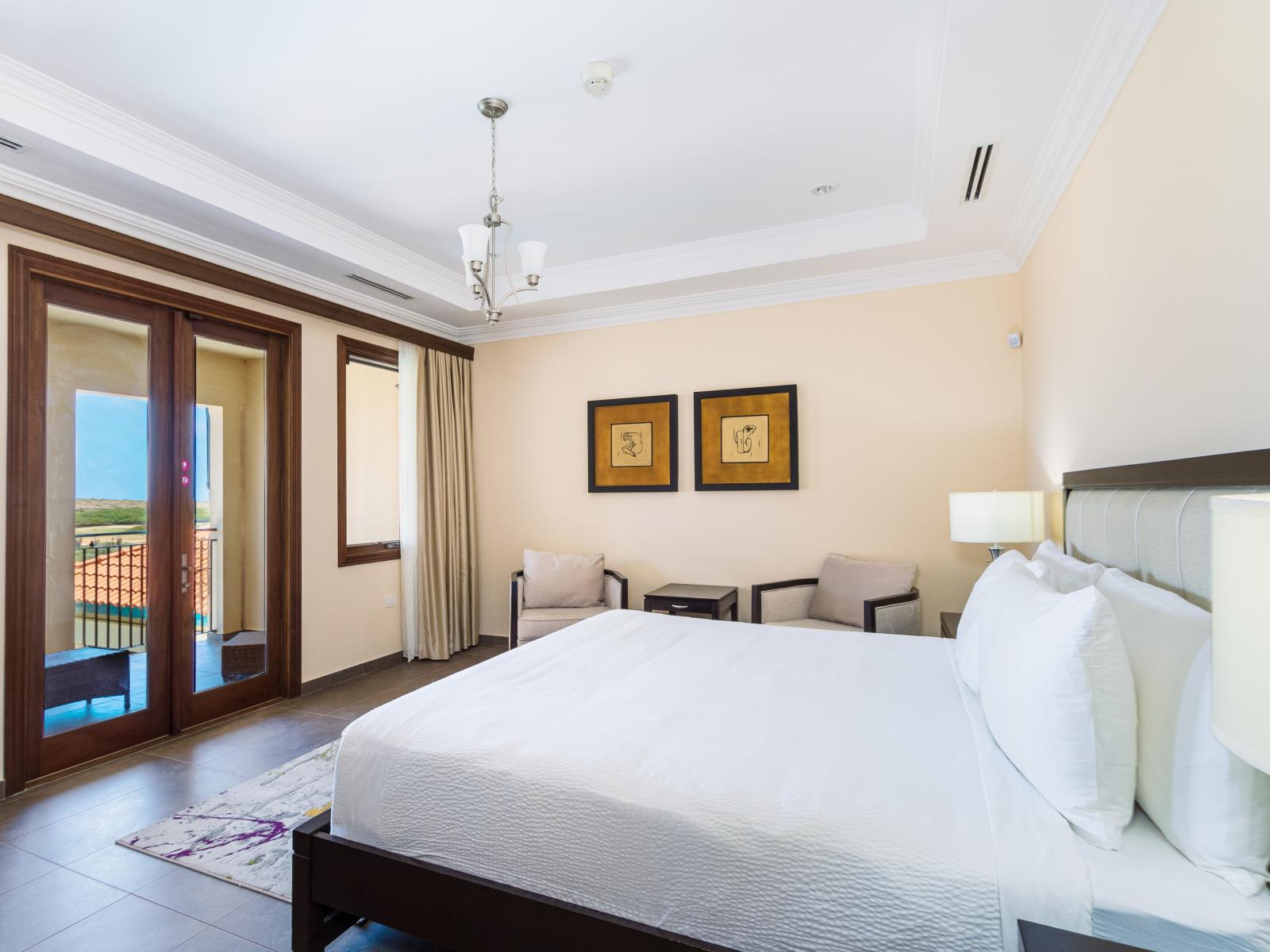 Unwind in opulence in Bedroom 3 with a spacious King size bed, TV for entertainment, and an attached bathroom, ensuring a restful night's sleep and seamless relaxation in your private retreat.