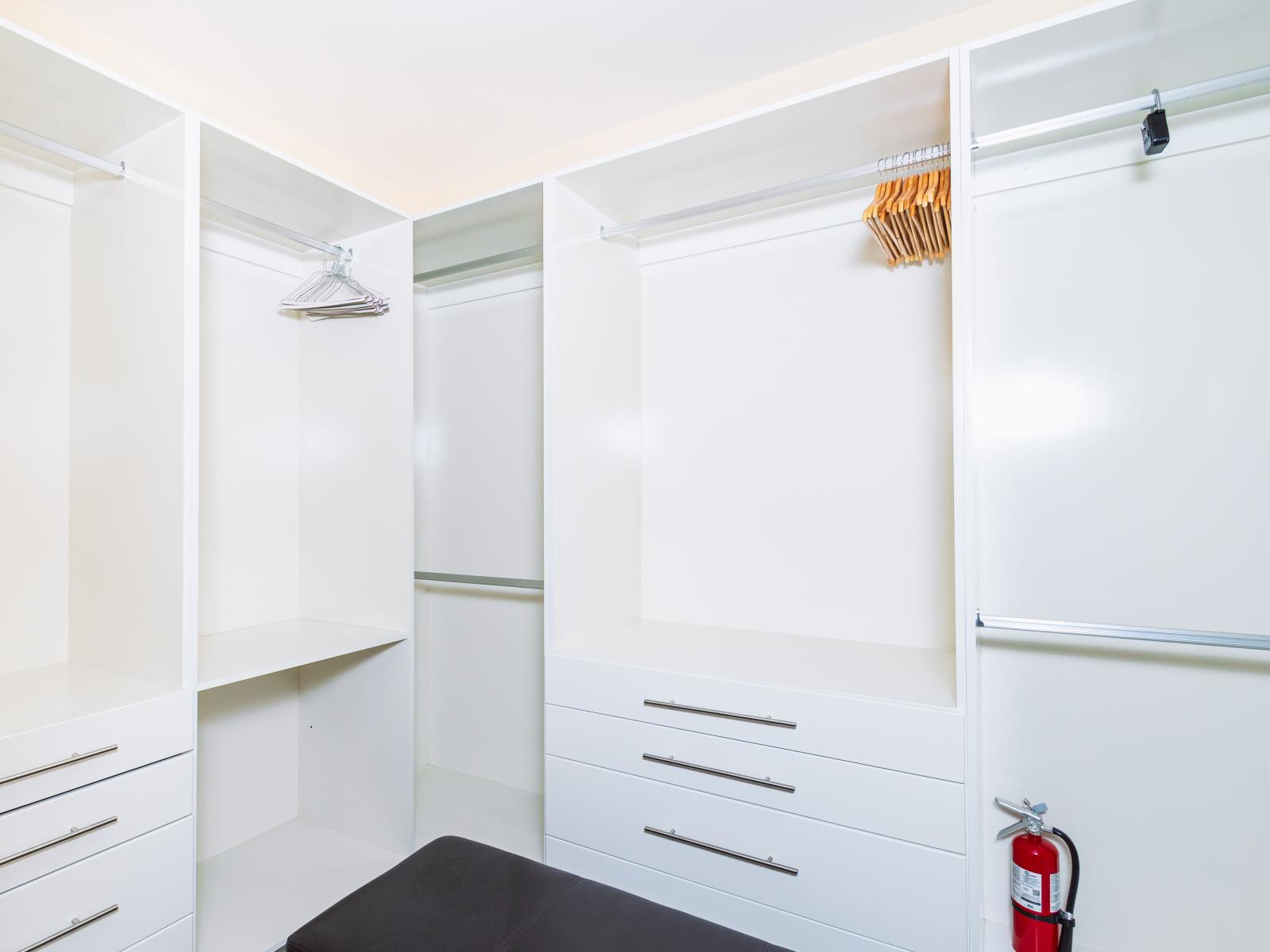 Enjoy convenience with Bedroom 4's spacious walk-in closet, keeping your wardrobe essentials organized throughout your stay.