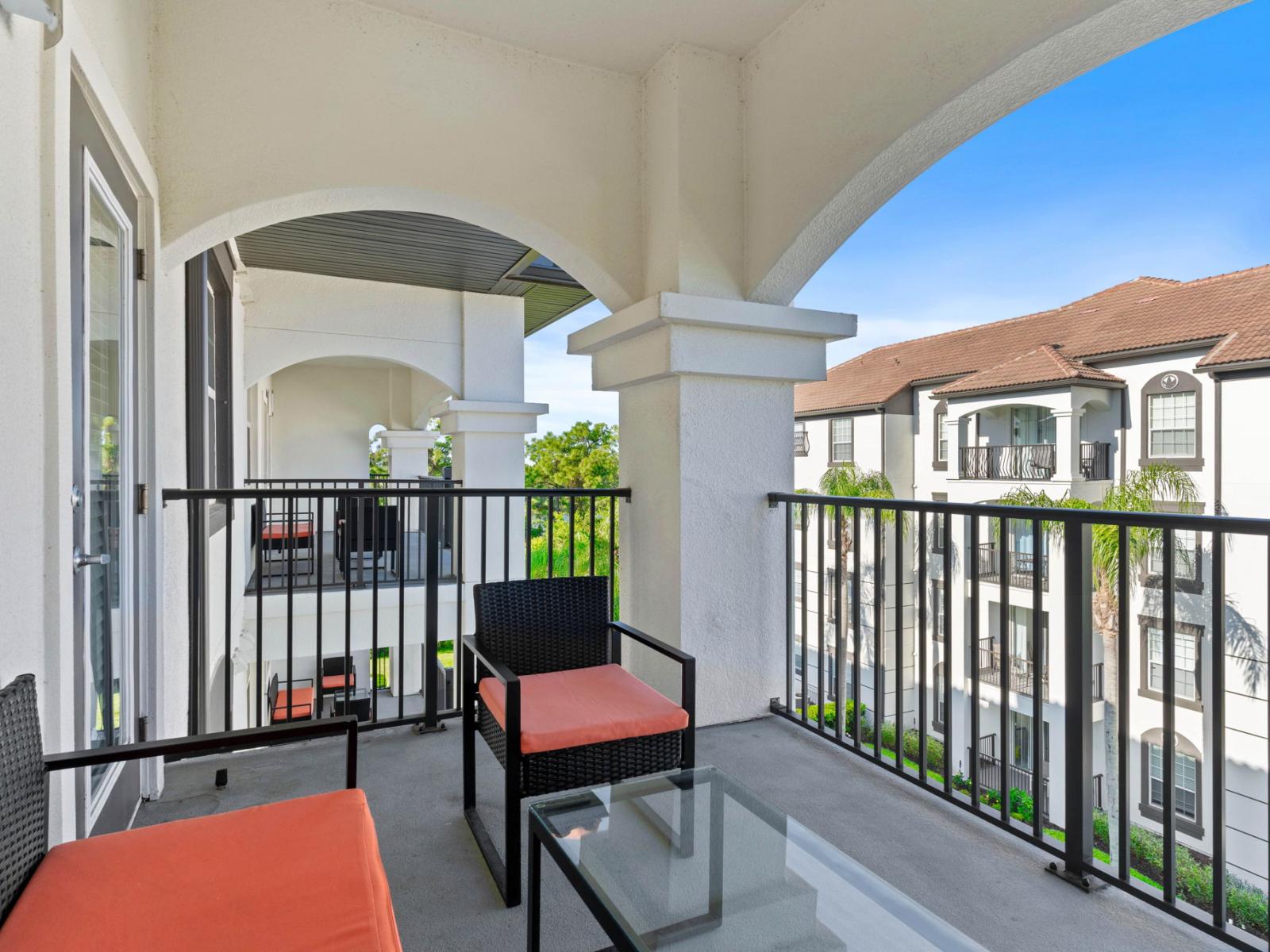 Step out onto this balcony and immerse yourself in the vibrant atmosphere of Vista Cay Resort. With the clubhouse and main pool just steps away, enjoy convenient access to resort amenities and endless relaxation.