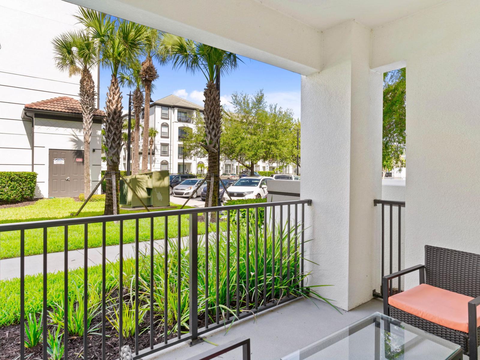 Nature's Embrace: Enjoy your morning coffee on the private balcony with a lush lawn view, a serene oasis amidst the urban bustle