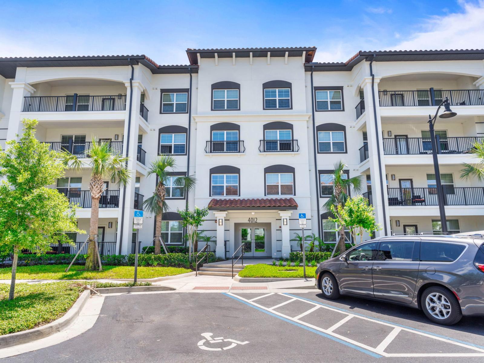 Marvelous building exterior of Vista Cay Resort - Stands as a testament to elegance and sophistication - Welcoming guests with its impressive facade and promising a luxurious retreat amidst Orlando's vibrant landscape.