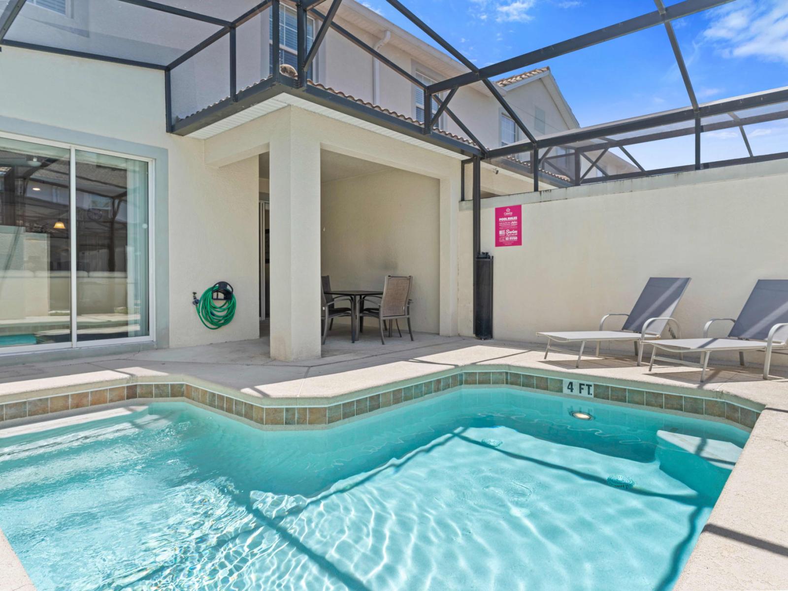 Amazing private pool of the town house in Kissimmee Florida - Enjoy leisurely moments in inviting pool area - Lounge in tranquility by the sparkling waters - Features outdoor dining and BBQ